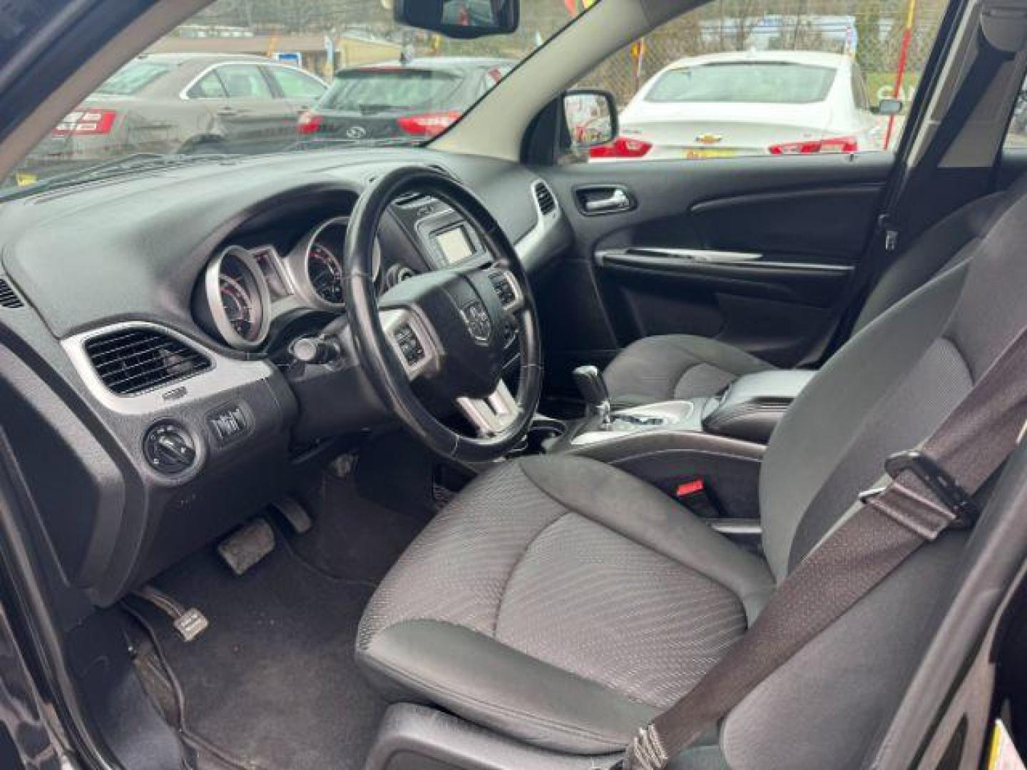 2012 black Dodge Journey SXT (3C4PDCBG1CT) with an 3.6L V6 DOHC 24V engine, 6-Speed Automatic transmission, located at 1806 Veterans Memorial Hwy SW, Austell, GA, 30168, (770) 944-9558, 33.817959, -84.606987 - Photo#5