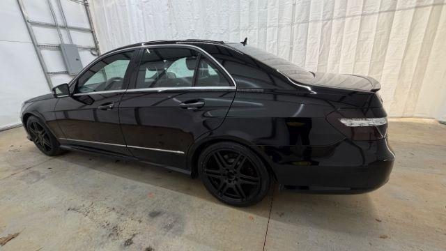 2010 Black Mercedes-Benz E-Class E350 Sedan (WDDHF5GB2AA) with an 3.5L V6 DOHC 24V engine, 7-Speed Automatic transmission, located at 1806 Veterans Memorial Hwy SW, Austell, GA, 30168, (770) 944-9558, 33.817959, -84.606987 - Photo#2