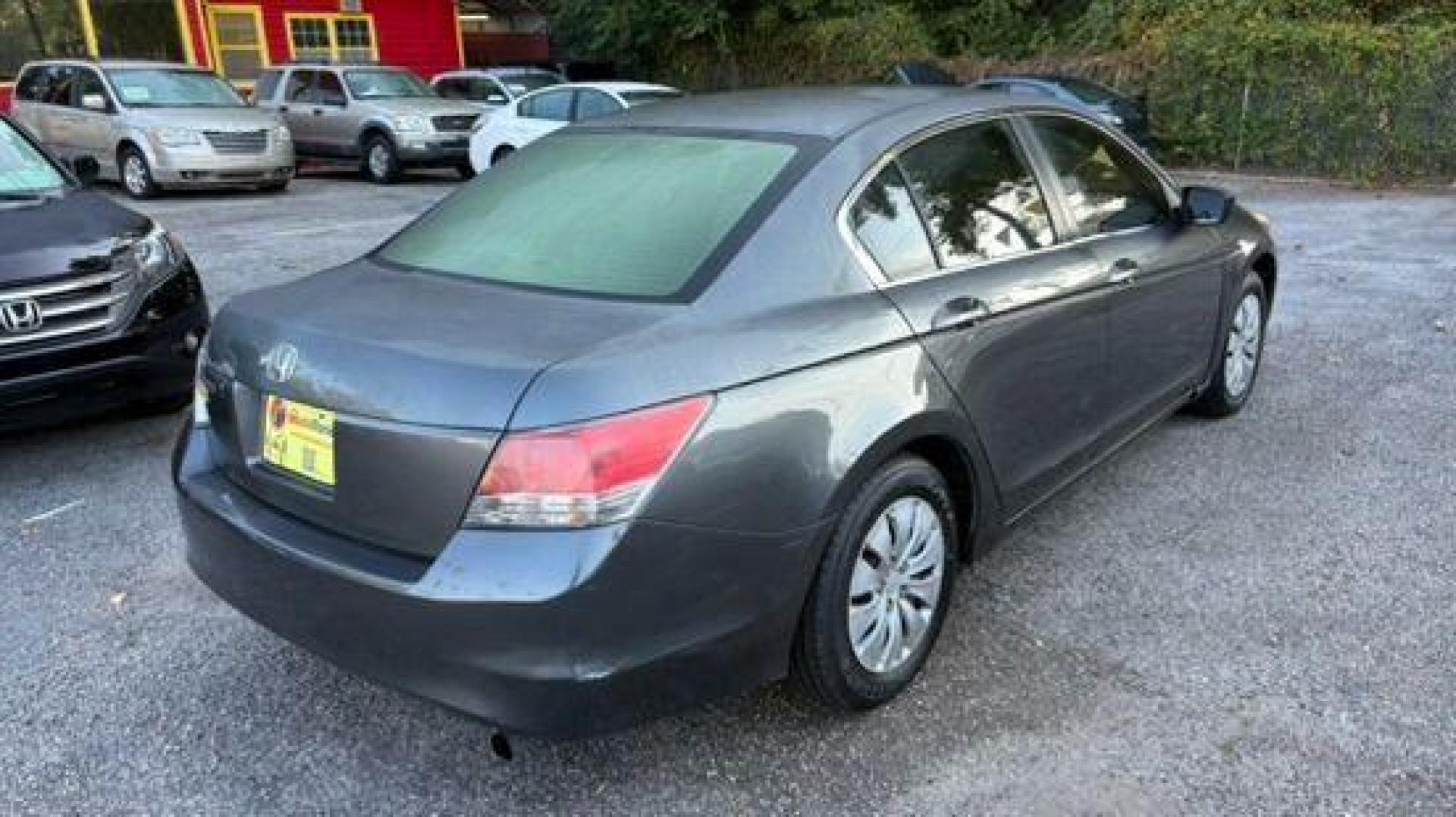 2010 Gray Honda Accord LX Sedan AT (1HGCP2F34AA) with an 2.4L L4 DOHC 16V engine, 5-Speed Automatic transmission, located at 1806 Veterans Memorial Hwy SW, Austell, GA, 30168, (770) 944-9558, 33.817959, -84.606987 - Photo#2