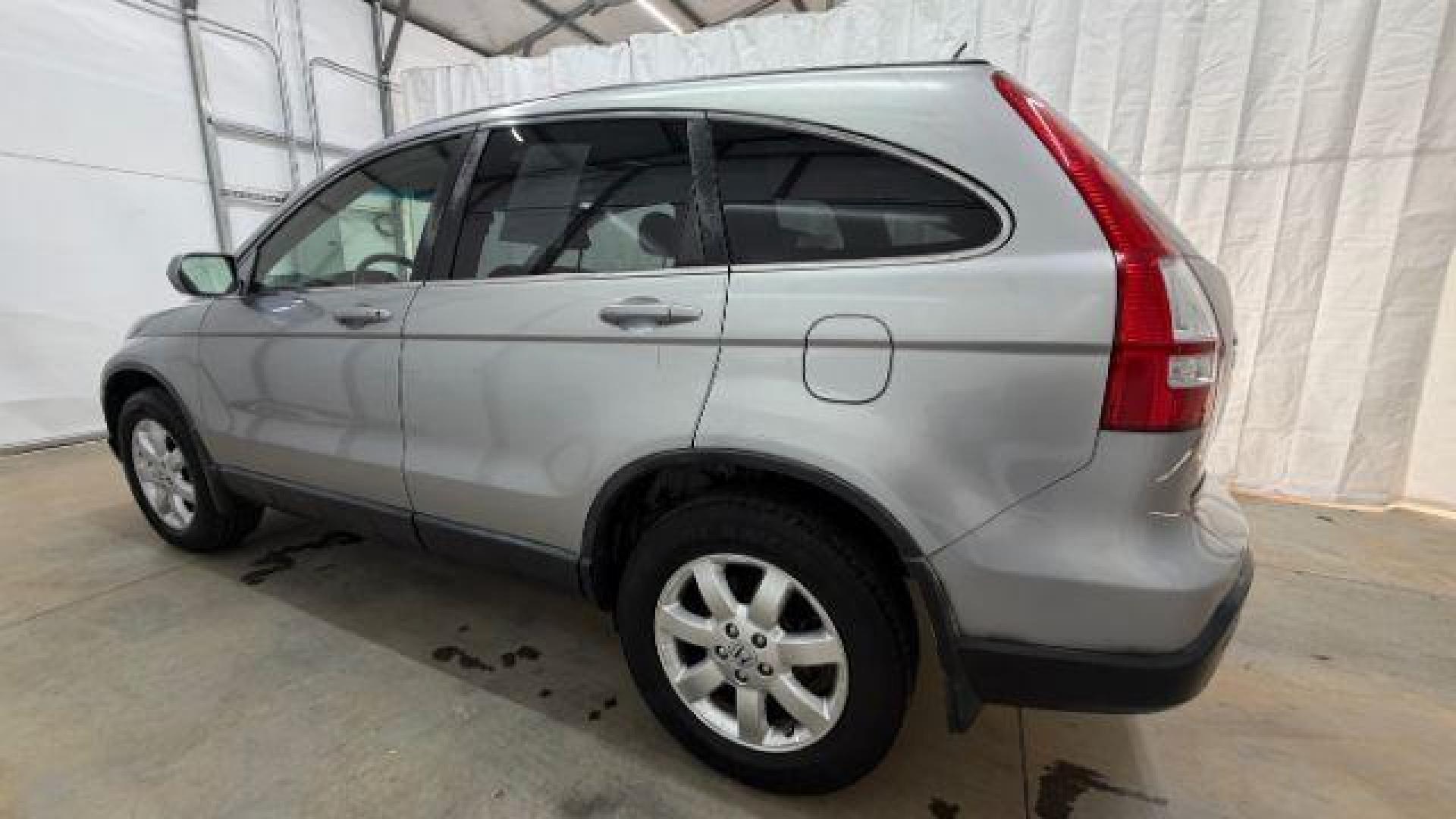 2008 Silver Honda CR-V EX-L 2WD AT (JHLRE38788C) with an 2.4L L4 DOHC 16V engine, 5-Speed Automatic transmission, located at 1806 Veterans Memorial Hwy SW, Austell, GA, 30168, (770) 944-9558, 33.817959, -84.606987 - Photo#2