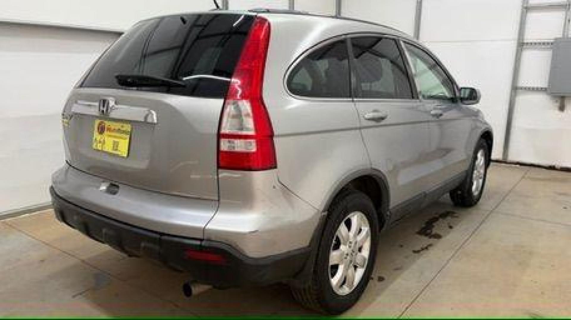 2008 Silver Honda CR-V EX-L 2WD AT (JHLRE38788C) with an 2.4L L4 DOHC 16V engine, 5-Speed Automatic transmission, located at 1806 Veterans Memorial Hwy SW, Austell, GA, 30168, (770) 944-9558, 33.817959, -84.606987 - Photo#5