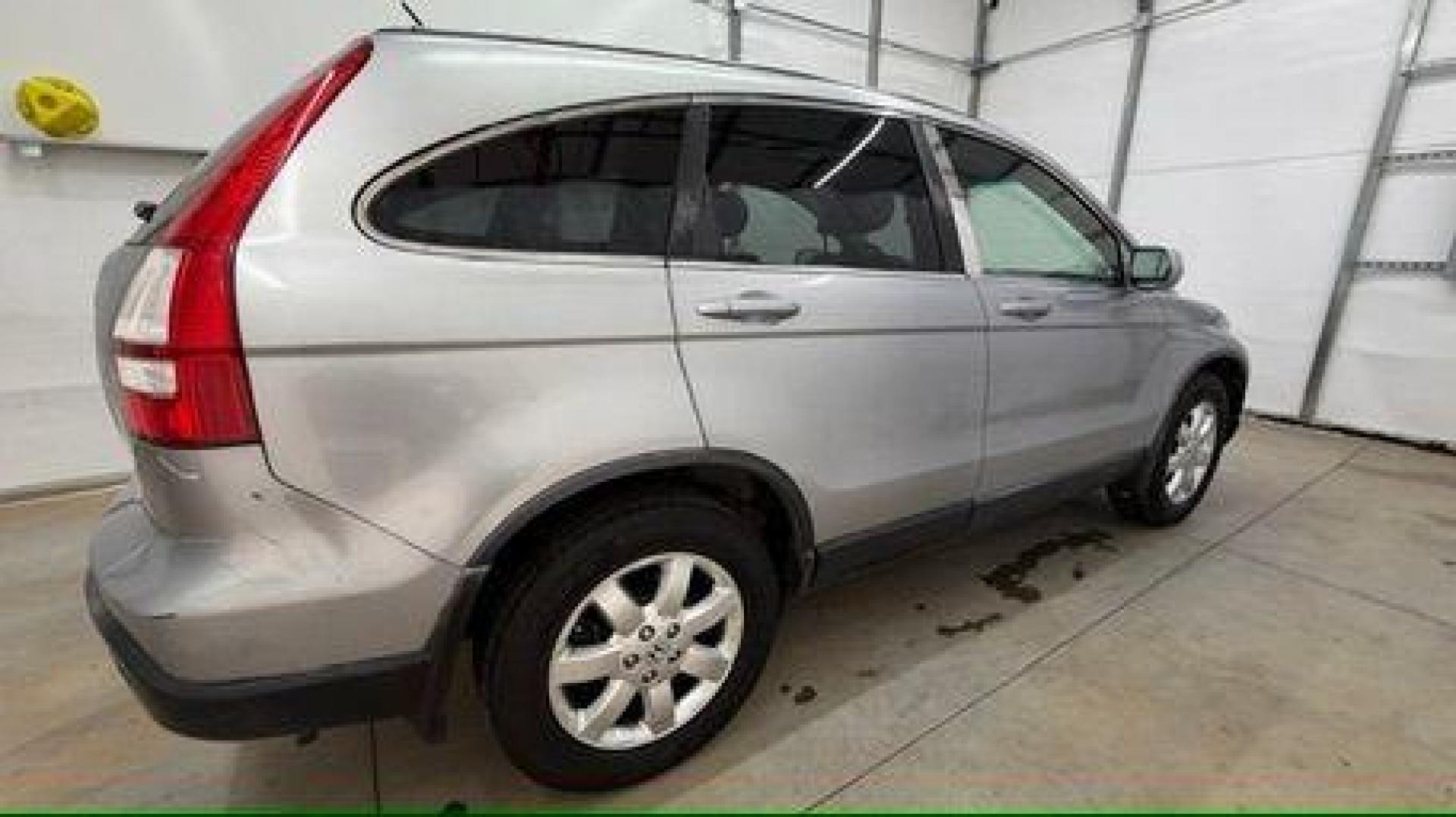 2008 Silver Honda CR-V EX-L 2WD AT (JHLRE38788C) with an 2.4L L4 DOHC 16V engine, 5-Speed Automatic transmission, located at 1806 Veterans Memorial Hwy SW, Austell, GA, 30168, (770) 944-9558, 33.817959, -84.606987 - Photo#6