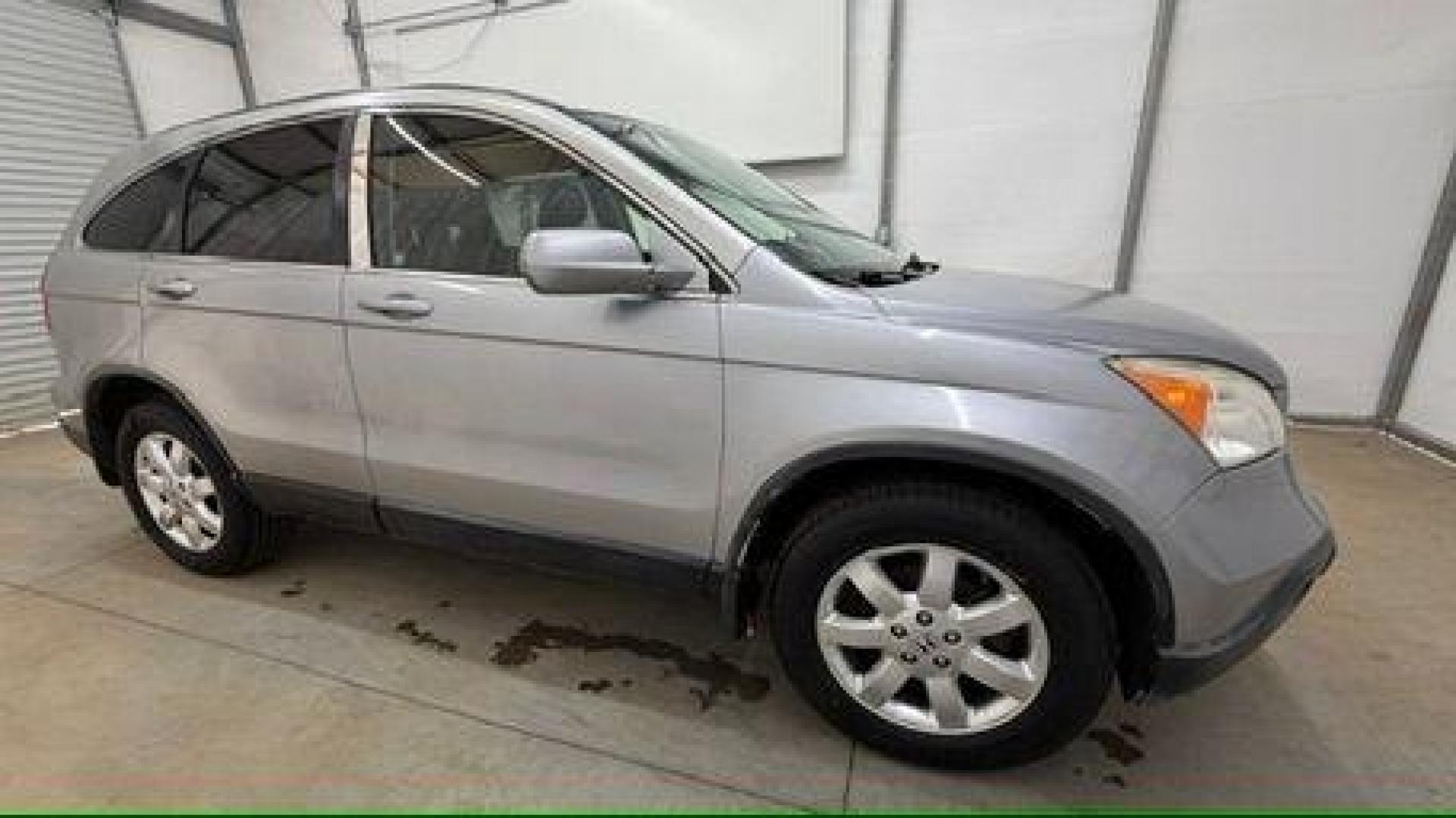 2008 Silver Honda CR-V EX-L 2WD AT (JHLRE38788C) with an 2.4L L4 DOHC 16V engine, 5-Speed Automatic transmission, located at 1806 Veterans Memorial Hwy SW, Austell, GA, 30168, (770) 944-9558, 33.817959, -84.606987 - Photo#7