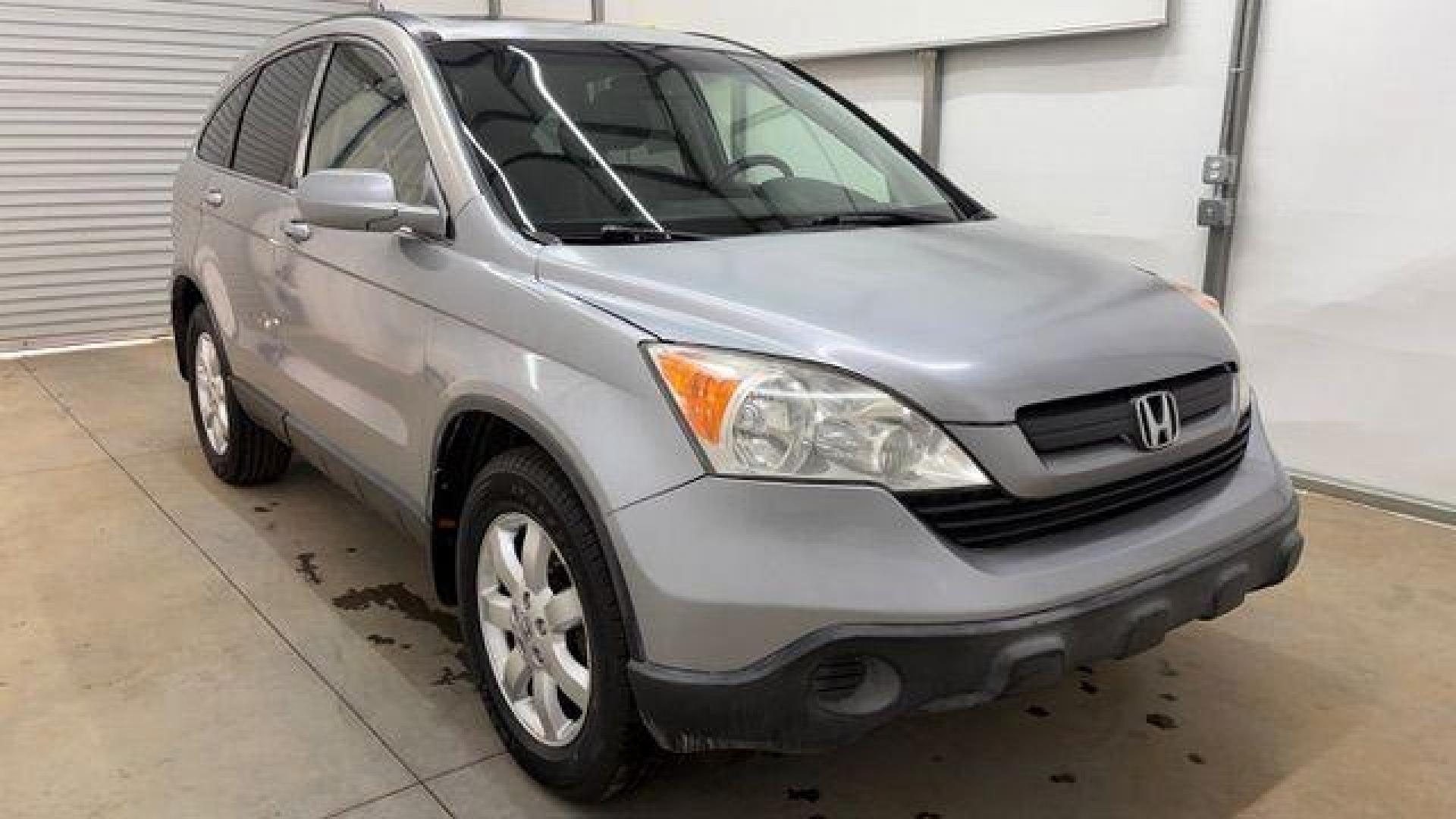 2008 Silver Honda CR-V EX-L 2WD AT (JHLRE38788C) with an 2.4L L4 DOHC 16V engine, 5-Speed Automatic transmission, located at 1806 Veterans Memorial Hwy SW, Austell, GA, 30168, (770) 944-9558, 33.817959, -84.606987 - Photo#8