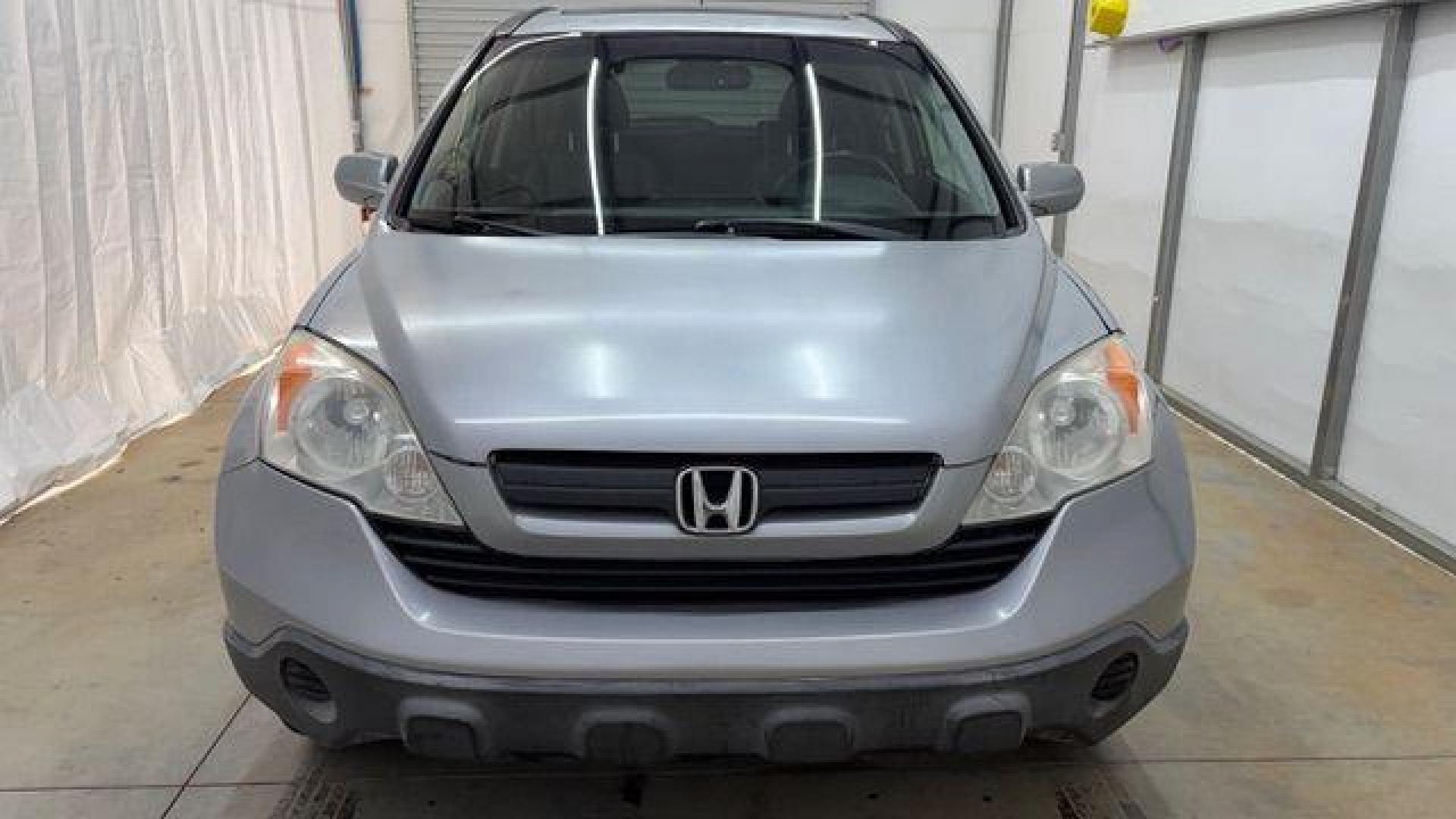 2008 Silver Honda CR-V EX-L 2WD AT (JHLRE38788C) with an 2.4L L4 DOHC 16V engine, 5-Speed Automatic transmission, located at 1806 Veterans Memorial Hwy SW, Austell, GA, 30168, (770) 944-9558, 33.817959, -84.606987 - Photo#9