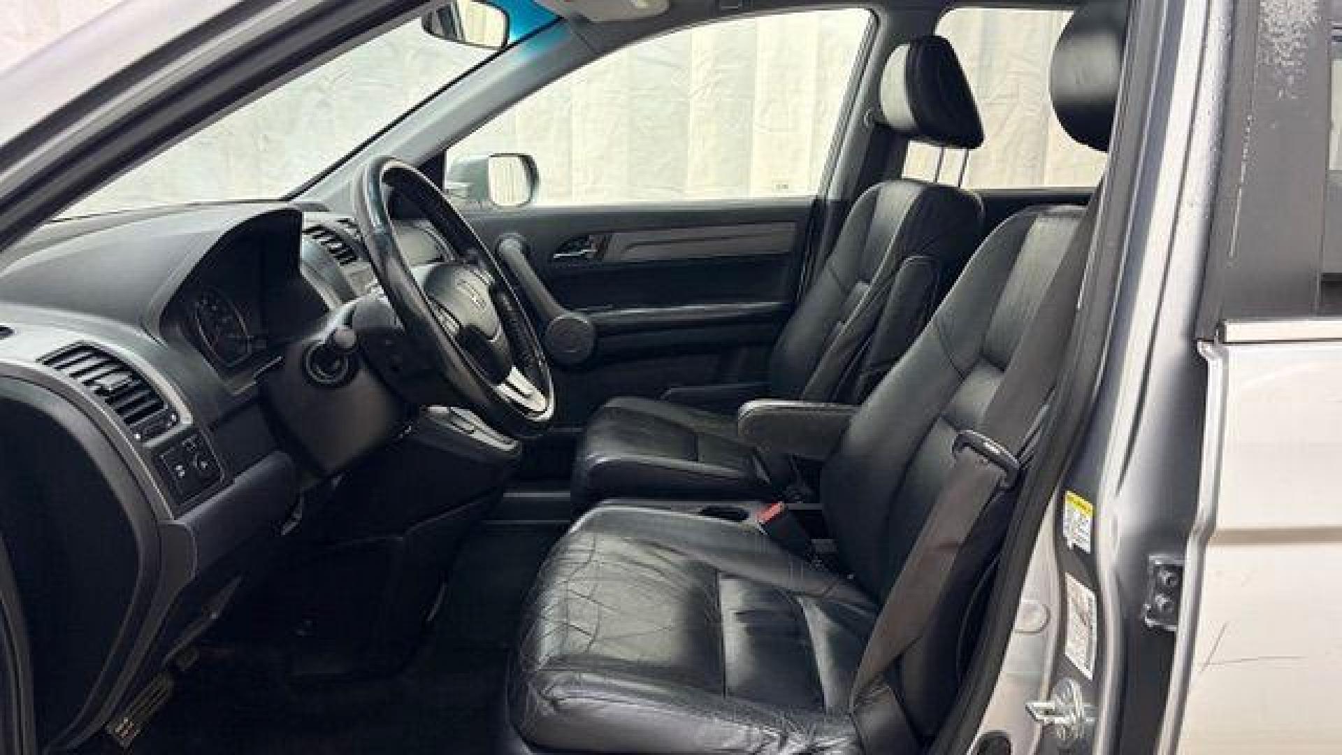 2008 Silver Honda CR-V EX-L 2WD AT (JHLRE38788C) with an 2.4L L4 DOHC 16V engine, 5-Speed Automatic transmission, located at 1806 Veterans Memorial Hwy SW, Austell, GA, 30168, (770) 944-9558, 33.817959, -84.606987 - Photo#11