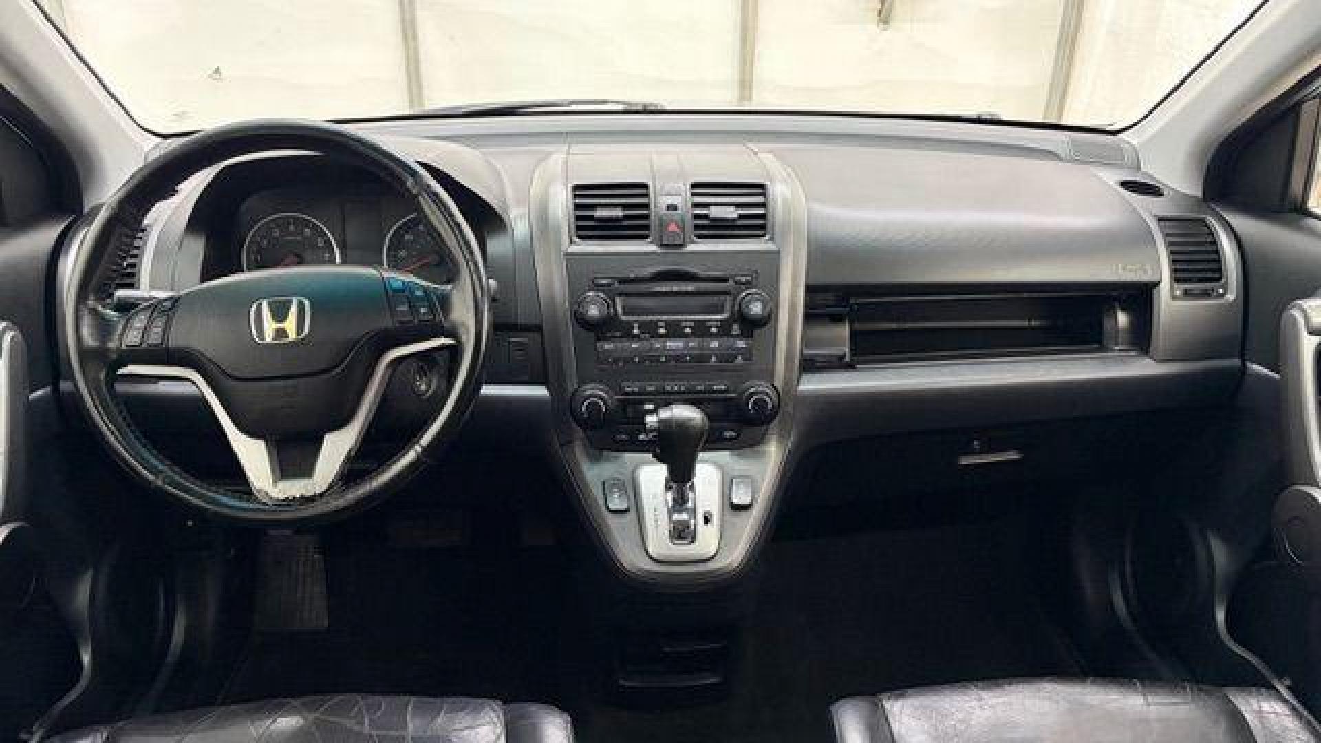 2008 Silver Honda CR-V EX-L 2WD AT (JHLRE38788C) with an 2.4L L4 DOHC 16V engine, 5-Speed Automatic transmission, located at 1806 Veterans Memorial Hwy SW, Austell, GA, 30168, (770) 944-9558, 33.817959, -84.606987 - Photo#15