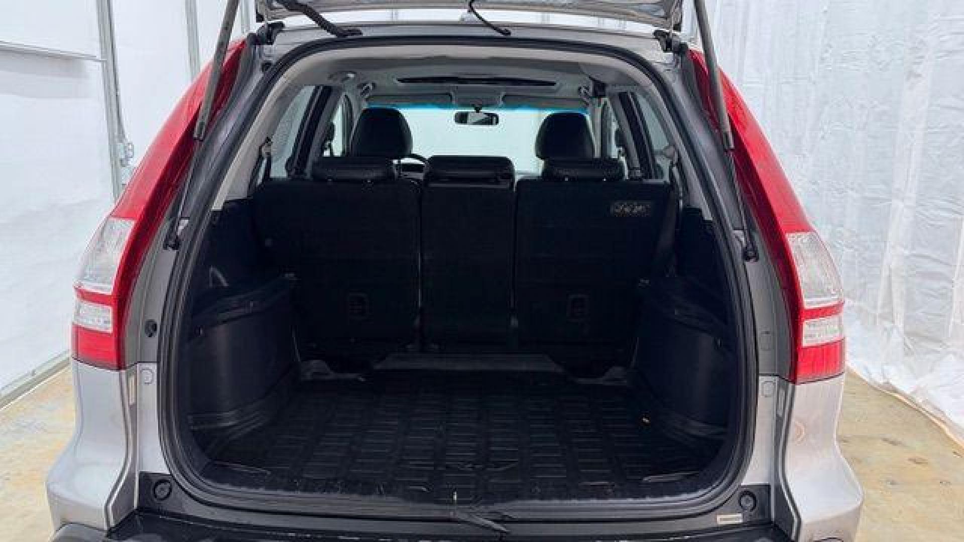 2008 Silver Honda CR-V EX-L 2WD AT (JHLRE38788C) with an 2.4L L4 DOHC 16V engine, 5-Speed Automatic transmission, located at 1806 Veterans Memorial Hwy SW, Austell, GA, 30168, (770) 944-9558, 33.817959, -84.606987 - Photo#16