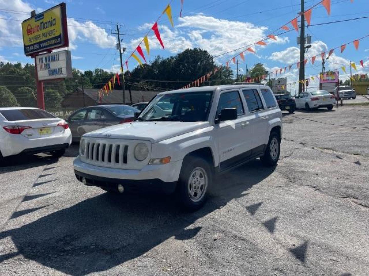 2014 White Jeep Patriot Sport 2WD (1C4NJPBAXED) with an 2.0L L4 DOHC 16V engine, Continuously Variable Transmission transmission, located at 1806 Veterans Memorial Hwy SW, Austell, GA, 30168, (770) 944-9558, 33.817959, -84.606987 - Photo#0