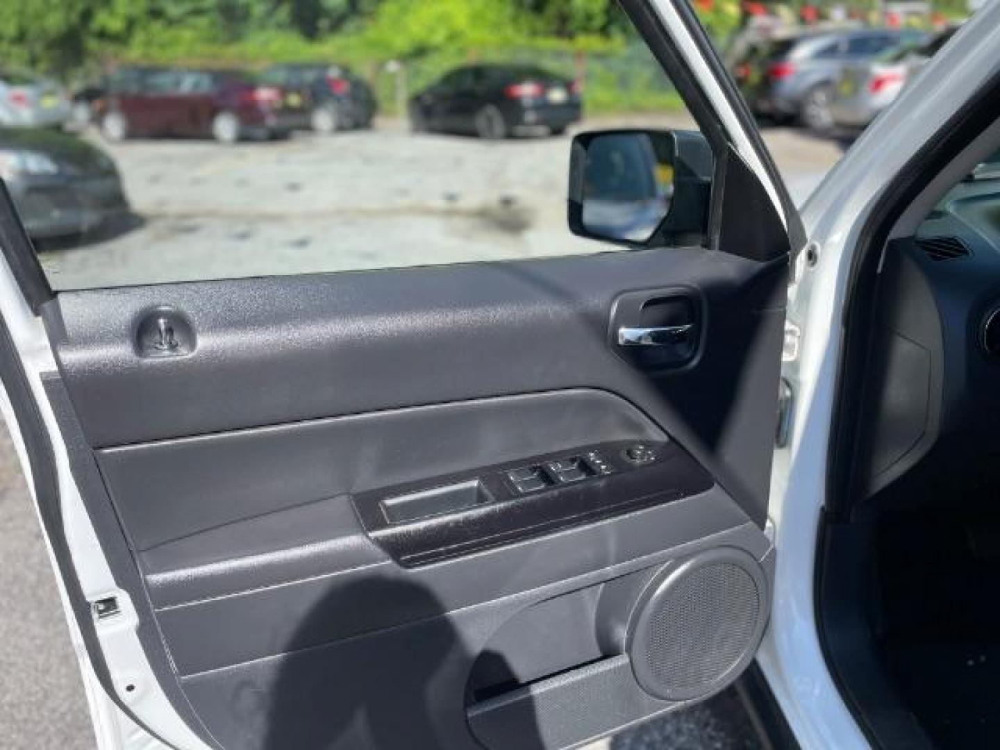 2014 White Jeep Patriot Sport 2WD (1C4NJPBAXED) with an 2.0L L4 DOHC 16V engine, Continuously Variable Transmission transmission, located at 1806 Veterans Memorial Hwy SW, Austell, GA, 30168, (770) 944-9558, 33.817959, -84.606987 - Photo#10