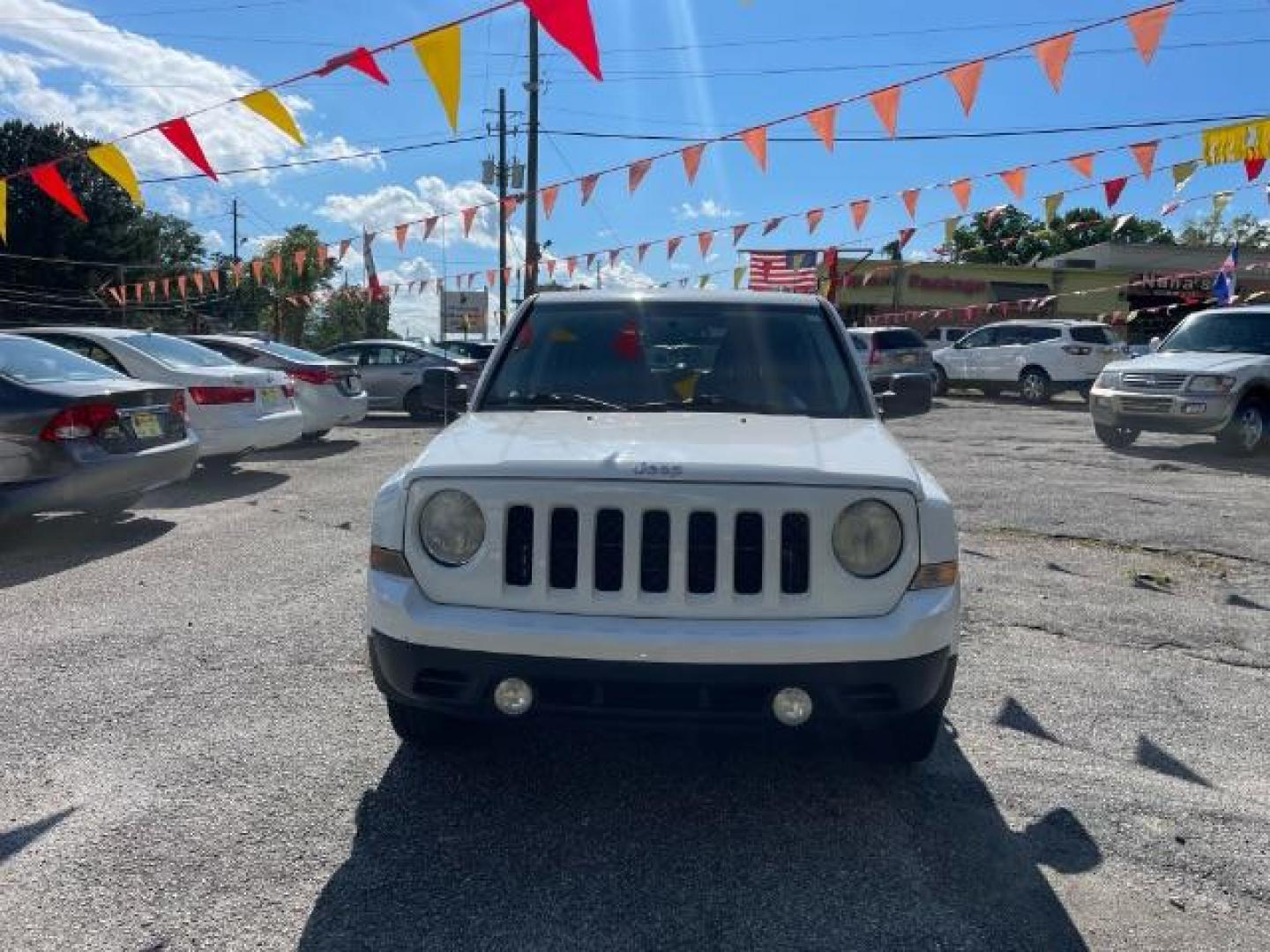 2014 White Jeep Patriot Sport 2WD (1C4NJPBAXED) with an 2.0L L4 DOHC 16V engine, Continuously Variable Transmission transmission, located at 1806 Veterans Memorial Hwy SW, Austell, GA, 30168, (770) 944-9558, 33.817959, -84.606987 - Photo#1
