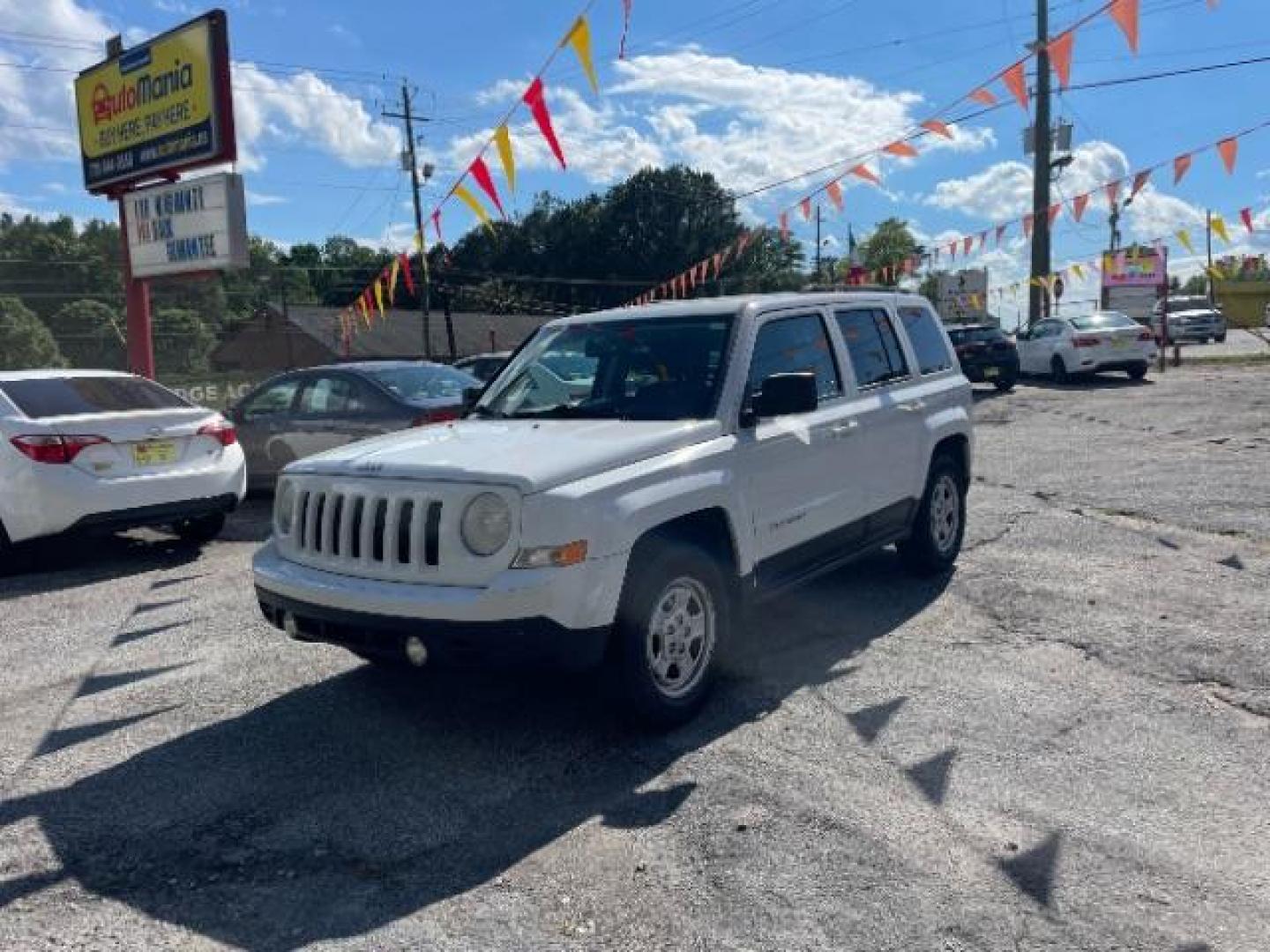 2014 White Jeep Patriot Sport 2WD (1C4NJPBAXED) with an 2.0L L4 DOHC 16V engine, Continuously Variable Transmission transmission, located at 1806 Veterans Memorial Hwy SW, Austell, GA, 30168, (770) 944-9558, 33.817959, -84.606987 - Photo#18