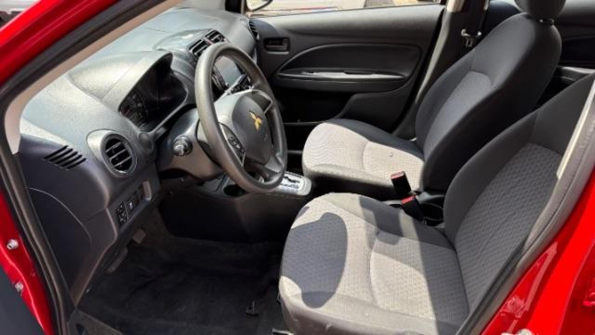 2018 Red Mitsubishi Mirage ES CVT (ML32A3HJ2JH) with an 1.2L L3 DOHC engine, Continuously Variabl transmission, located at 1806 Veterans Memorial Hwy SW, Austell, GA, 30168, (770) 944-9558, 33.817959, -84.606987 - Photo#10