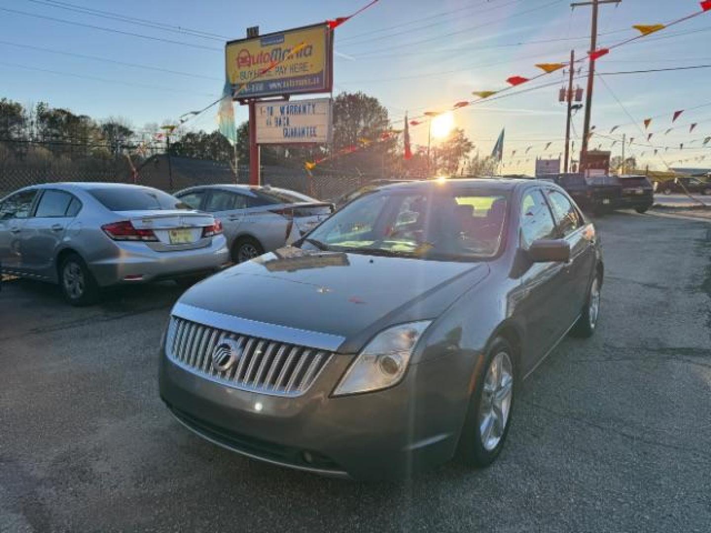 2010 Gray Mercury Milan I4 (3MEHM0HA1AR) with an 2.5L L4 DOHC 16V engine, 5-Speed Automatic transmission, located at 1806 Veterans Memorial Hwy SW, Austell, GA, 30168, (770) 944-9558, 33.817959, -84.606987 - Photo#0