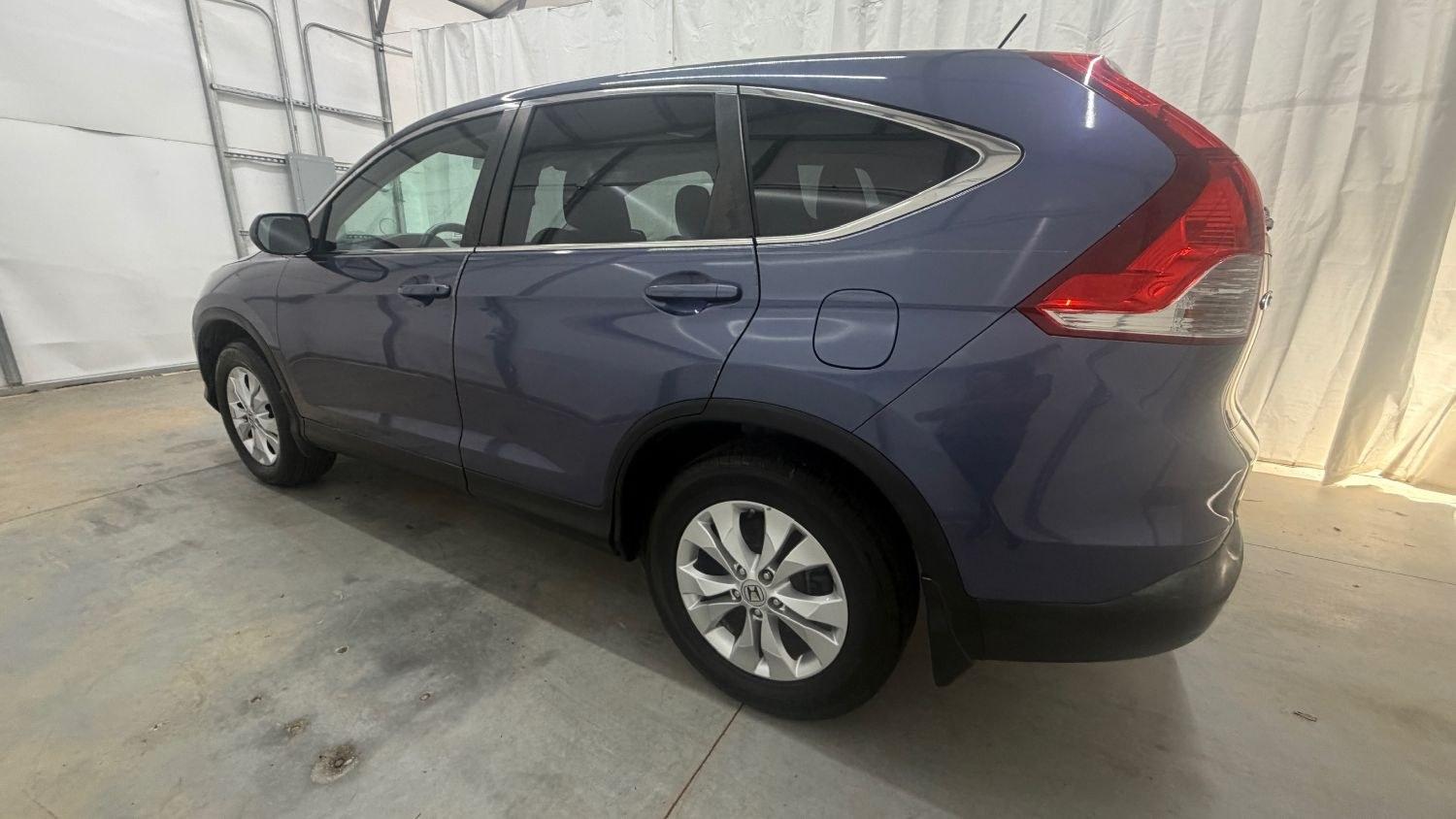 2012 Blue Honda CR-V EX 2WD 5-Speed AT (3CZRM3H55CG) with an 2.4L L4 DOHC 16V engine, 5-Speed Automatic transmission, located at 1806 Veterans Memorial Hwy SW, Austell, GA, 30168, (770) 944-9558, 33.817959, -84.606987 - Why Choose Automania? At Automania, we make car buying easy and stress-free, with over 20 years serving Austell, GA and the surrounding communities. WE FINANCE GOOD AND NOT SO GOOD CREDIT, we work with all credit types, and every vehicle comes with a free vehicle history report so you know its backg- Photo#2