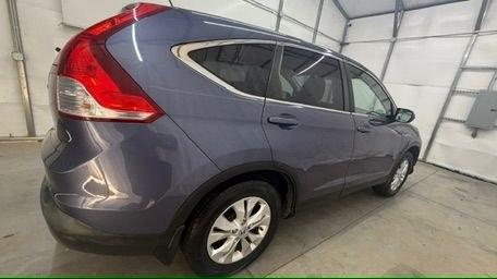 2012 Blue Honda CR-V EX 2WD 5-Speed AT (3CZRM3H55CG) with an 2.4L L4 DOHC 16V engine, 5-Speed Automatic transmission, located at 1806 Veterans Memorial Hwy SW, Austell, GA, 30168, (770) 944-9558, 33.817959, -84.606987 - Why Choose Automania? At Automania, we make car buying easy and stress-free, with over 20 years serving Austell, GA and the surrounding communities. WE FINANCE GOOD AND NOT SO GOOD CREDIT, we work with all credit types, and every vehicle comes with a free vehicle history report so you know its backg- Photo#6