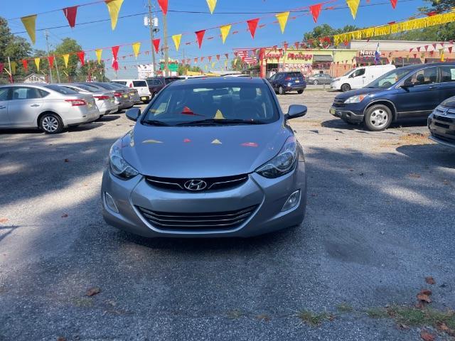 2013 Silver Hyundai Elantra Limited (KMHDH4AE4DU) with an 1.8L L4 DOHC 16V engine, 6-Speed Automatic transmission, located at 1806 Veterans Memorial Hwy SW, Austell, GA, 30168, (770) 944-9558, 33.817959, -84.606987 - Photo#1
