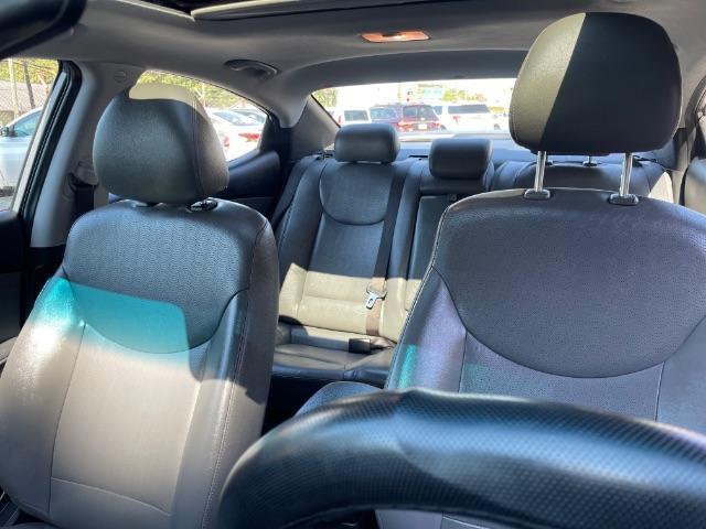 2013 Silver Hyundai Elantra Limited (KMHDH4AE4DU) with an 1.8L L4 DOHC 16V engine, 6-Speed Automatic transmission, located at 1806 Veterans Memorial Hwy SW, Austell, GA, 30168, (770) 944-9558, 33.817959, -84.606987 - Photo#5