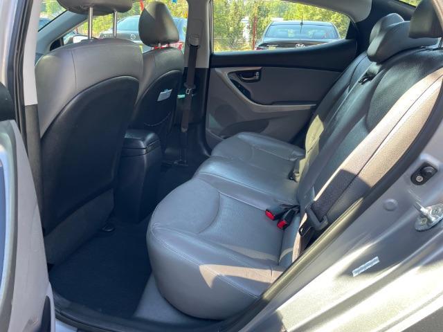 2013 Silver Hyundai Elantra Limited (KMHDH4AE4DU) with an 1.8L L4 DOHC 16V engine, 6-Speed Automatic transmission, located at 1806 Veterans Memorial Hwy SW, Austell, GA, 30168, (770) 944-9558, 33.817959, -84.606987 - Photo#7