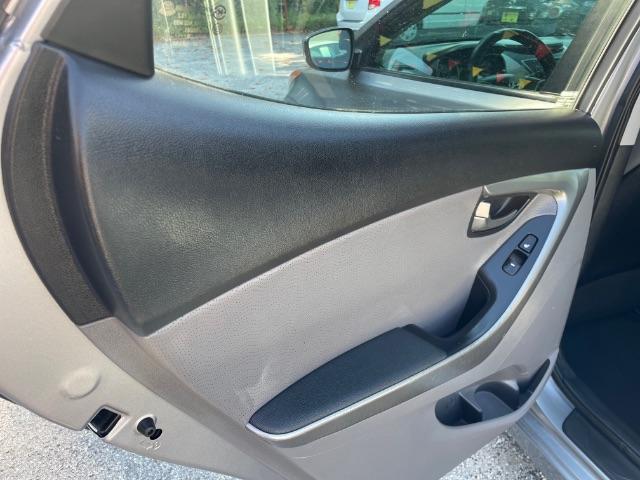 2013 Silver Hyundai Elantra Limited (KMHDH4AE4DU) with an 1.8L L4 DOHC 16V engine, 6-Speed Automatic transmission, located at 1806 Veterans Memorial Hwy SW, Austell, GA, 30168, (770) 944-9558, 33.817959, -84.606987 - Photo#9
