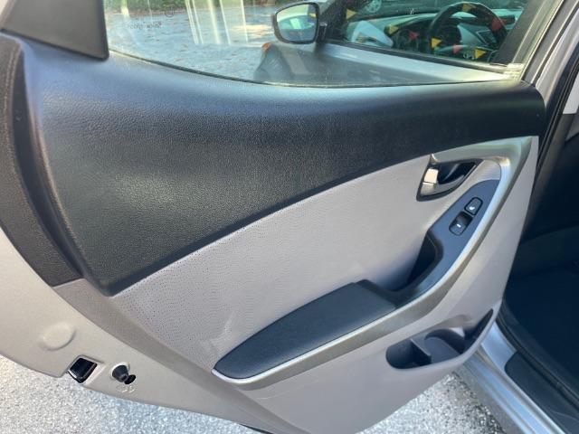 2013 Silver Hyundai Elantra Limited (KMHDH4AE4DU) with an 1.8L L4 DOHC 16V engine, 6-Speed Automatic transmission, located at 1806 Veterans Memorial Hwy SW, Austell, GA, 30168, (770) 944-9558, 33.817959, -84.606987 - Photo#15