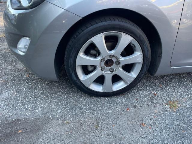 2013 Silver Hyundai Elantra Limited (KMHDH4AE4DU) with an 1.8L L4 DOHC 16V engine, 6-Speed Automatic transmission, located at 1806 Veterans Memorial Hwy SW, Austell, GA, 30168, (770) 944-9558, 33.817959, -84.606987 - Photo#16