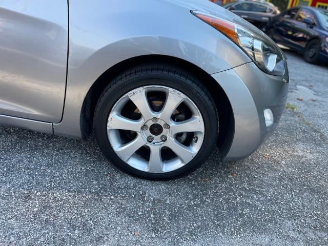 2013 Silver Hyundai Elantra Limited (KMHDH4AE4DU) with an 1.8L L4 DOHC 16V engine, 6-Speed Automatic transmission, located at 1806 Veterans Memorial Hwy SW, Austell, GA, 30168, (770) 944-9558, 33.817959, -84.606987 - Photo#19