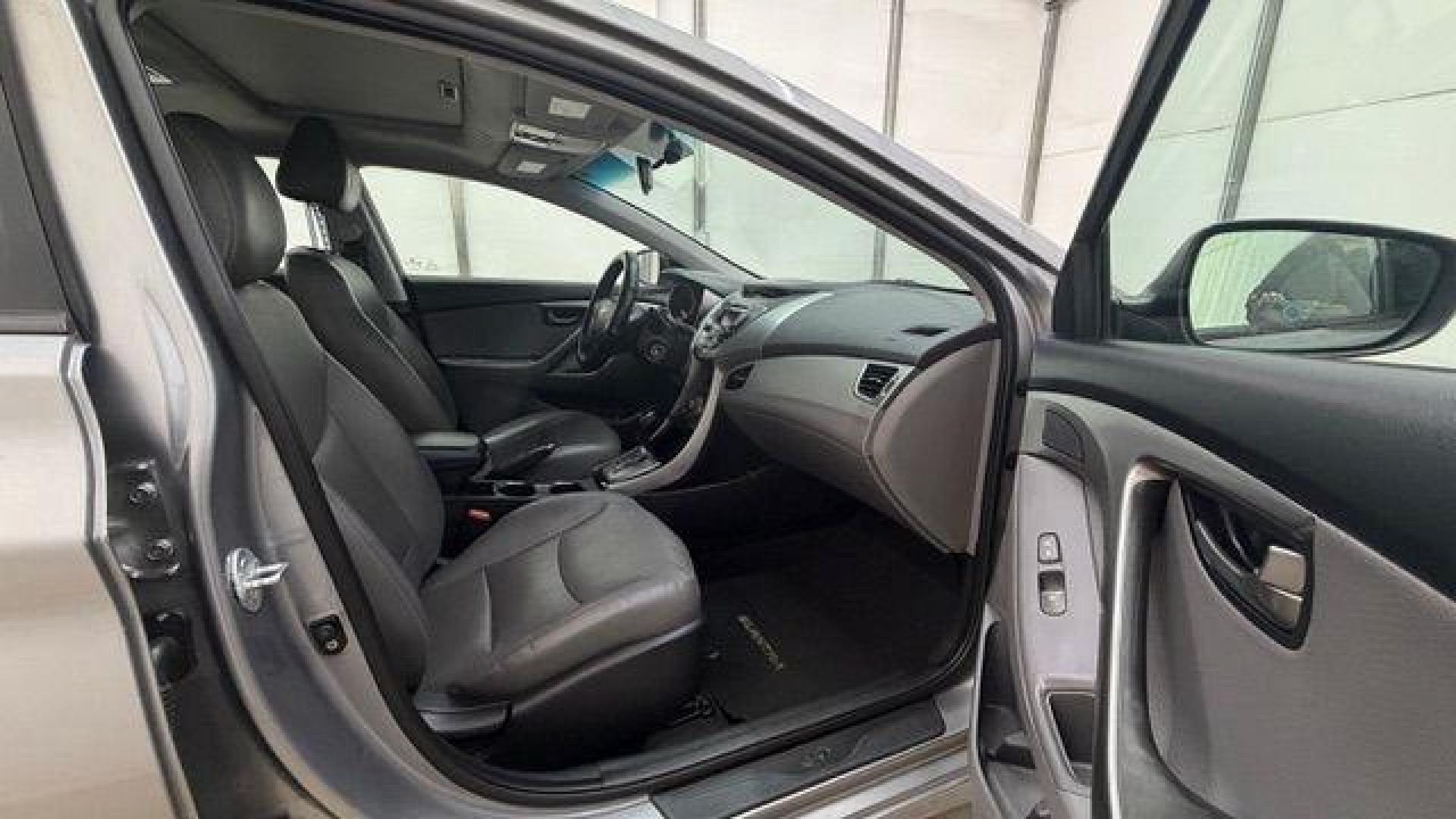 2013 Silver Hyundai Elantra Limited (KMHDH4AE4DU) with an 1.8L L4 DOHC 16V engine, 6-Speed Automatic transmission, located at 1806 Veterans Memorial Hwy SW, Austell, GA, 30168, (770) 944-9558, 33.817959, -84.606987 - Photo#17