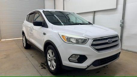 2017 White Ford Escape SE FWD (1FMCU0GD2HU) with an 1.5L L4 DOHC 16V engine, 6-Speed Automatic transmission, located at 1806 Veterans Memorial Hwy SW, Austell, GA, 30168, (770) 944-9558, 33.817959, -84.606987 - Photo#8