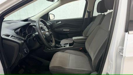 2017 White Ford Escape SE FWD (1FMCU0GD2HU) with an 1.5L L4 DOHC 16V engine, 6-Speed Automatic transmission, located at 1806 Veterans Memorial Hwy SW, Austell, GA, 30168, (770) 944-9558, 33.817959, -84.606987 - Photo#12