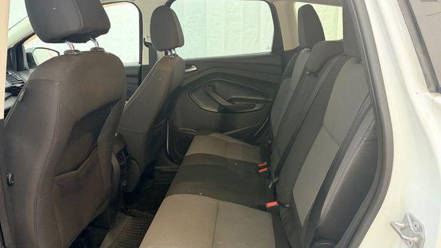 2017 White Ford Escape SE FWD (1FMCU0GD2HU) with an 1.5L L4 DOHC 16V engine, 6-Speed Automatic transmission, located at 1806 Veterans Memorial Hwy SW, Austell, GA, 30168, (770) 944-9558, 33.817959, -84.606987 - Photo#14