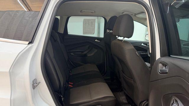 2017 White Ford Escape SE FWD (1FMCU0GD2HU) with an 1.5L L4 DOHC 16V engine, 6-Speed Automatic transmission, located at 1806 Veterans Memorial Hwy SW, Austell, GA, 30168, (770) 944-9558, 33.817959, -84.606987 - Photo#17