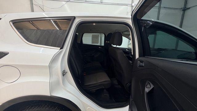 2017 White Ford Escape SE FWD (1FMCU0GD2HU) with an 1.5L L4 DOHC 16V engine, 6-Speed Automatic transmission, located at 1806 Veterans Memorial Hwy SW, Austell, GA, 30168, (770) 944-9558, 33.817959, -84.606987 - Photo#18