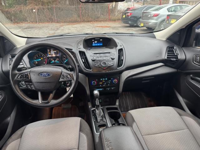 2017 White Ford Escape SE FWD (1FMCU0GD2HU) with an 1.5L L4 DOHC 16V engine, 6-Speed Automatic transmission, located at 1806 Veterans Memorial Hwy SW, Austell, GA, 30168, (770) 944-9558, 33.817959, -84.606987 - Photo#11