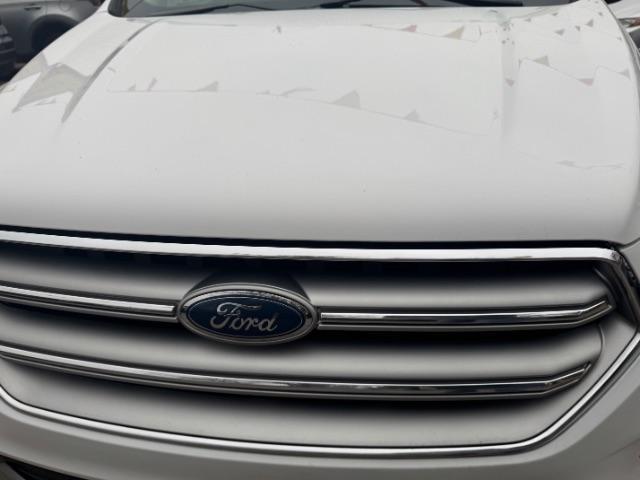 2017 White Ford Escape SE FWD (1FMCU0GD2HU) with an 1.5L L4 DOHC 16V engine, 6-Speed Automatic transmission, located at 1806 Veterans Memorial Hwy SW, Austell, GA, 30168, (770) 944-9558, 33.817959, -84.606987 - Photo#16