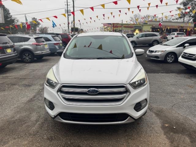 2017 White Ford Escape SE FWD (1FMCU0GD2HU) with an 1.5L L4 DOHC 16V engine, 6-Speed Automatic transmission, located at 1806 Veterans Memorial Hwy SW, Austell, GA, 30168, (770) 944-9558, 33.817959, -84.606987 - Photo#1