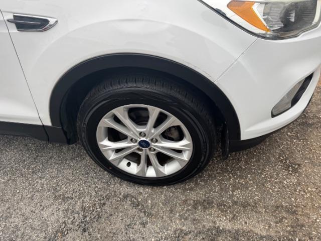 2017 White Ford Escape SE FWD (1FMCU0GD2HU) with an 1.5L L4 DOHC 16V engine, 6-Speed Automatic transmission, located at 1806 Veterans Memorial Hwy SW, Austell, GA, 30168, (770) 944-9558, 33.817959, -84.606987 - Photo#19