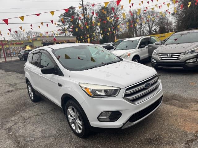 2017 White Ford Escape SE FWD (1FMCU0GD2HU) with an 1.5L L4 DOHC 16V engine, 6-Speed Automatic transmission, located at 1806 Veterans Memorial Hwy SW, Austell, GA, 30168, (770) 944-9558, 33.817959, -84.606987 - Photo#2