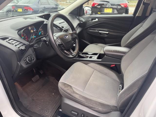 2017 White Ford Escape SE FWD (1FMCU0GD2HU) with an 1.5L L4 DOHC 16V engine, 6-Speed Automatic transmission, located at 1806 Veterans Memorial Hwy SW, Austell, GA, 30168, (770) 944-9558, 33.817959, -84.606987 - Photo#6