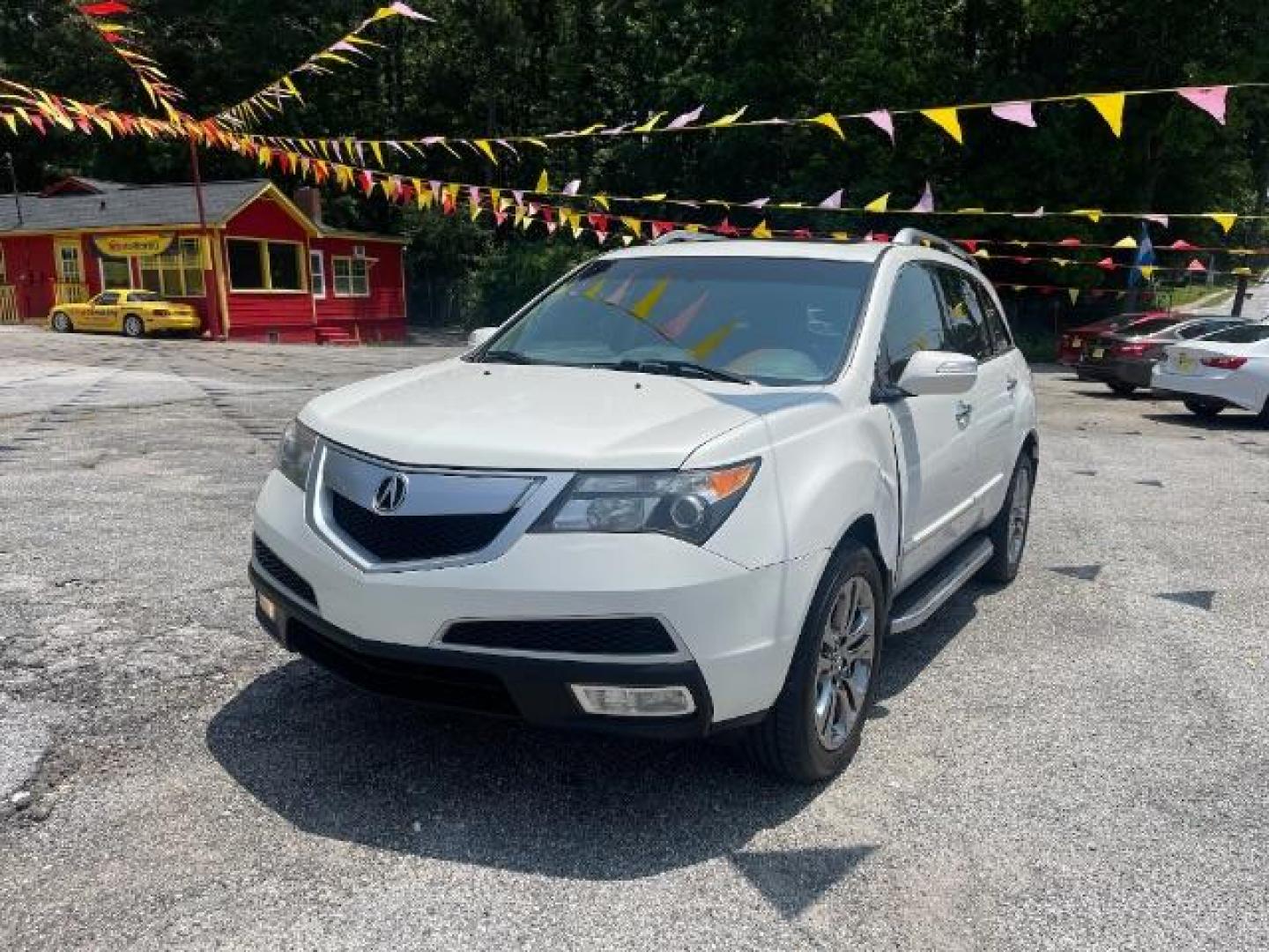 2011 White Acura MDX 6-Spd AT w/Tech Pack (2HNYD2H69BH) with an 3.7L V6 SOHC 24V engine, 6-Speed Automatic transmission, located at 1806 Veterans Memorial Hwy SW, Austell, GA, 30168, (770) 944-9558, 33.817959, -84.606987 - Photo#2