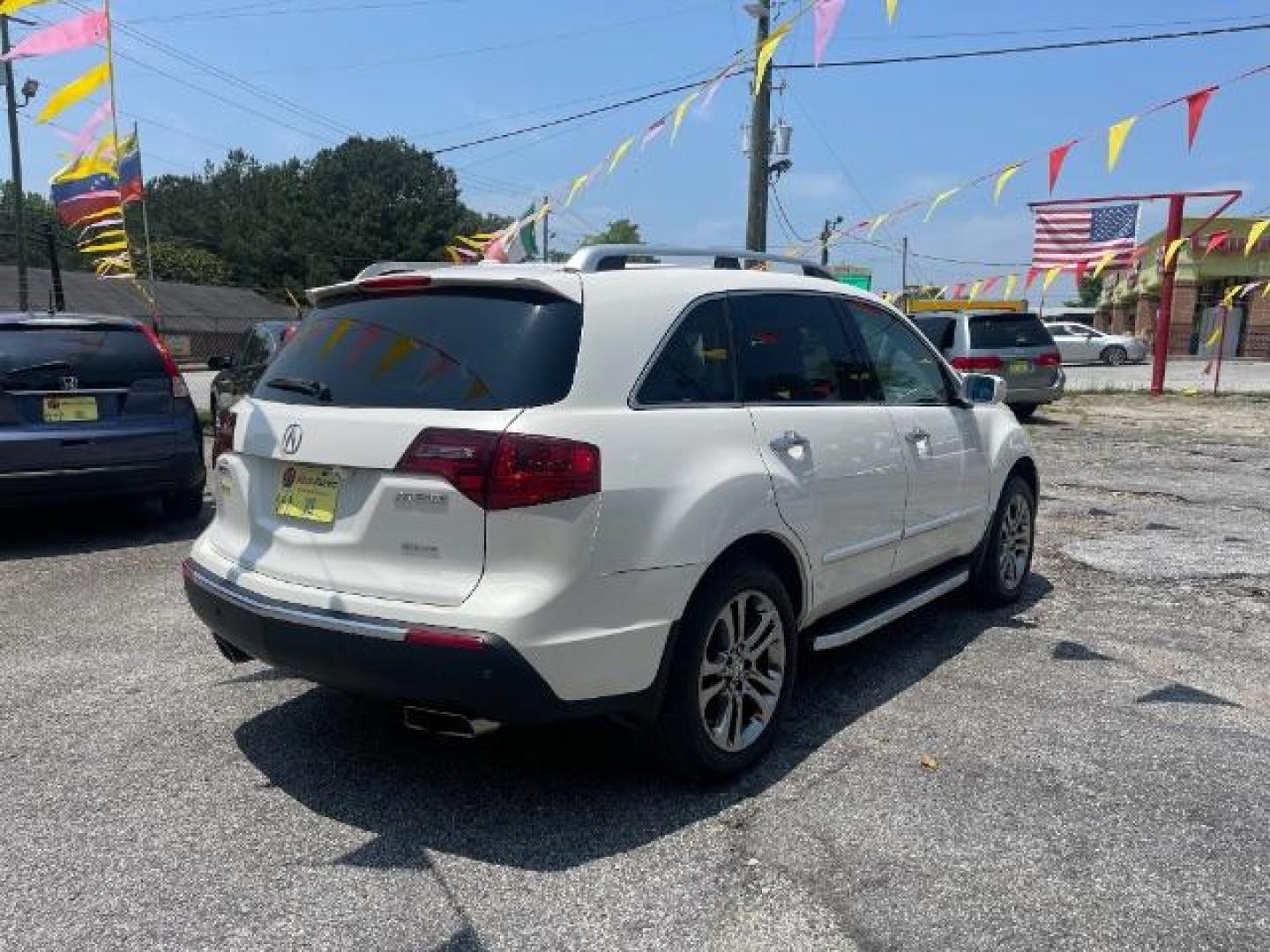 2011 White Acura MDX 6-Spd AT w/Tech Pack (2HNYD2H69BH) with an 3.7L V6 SOHC 24V engine, 6-Speed Automatic transmission, located at 1806 Veterans Memorial Hwy SW, Austell, GA, 30168, (770) 944-9558, 33.817959, -84.606987 - Photo#3