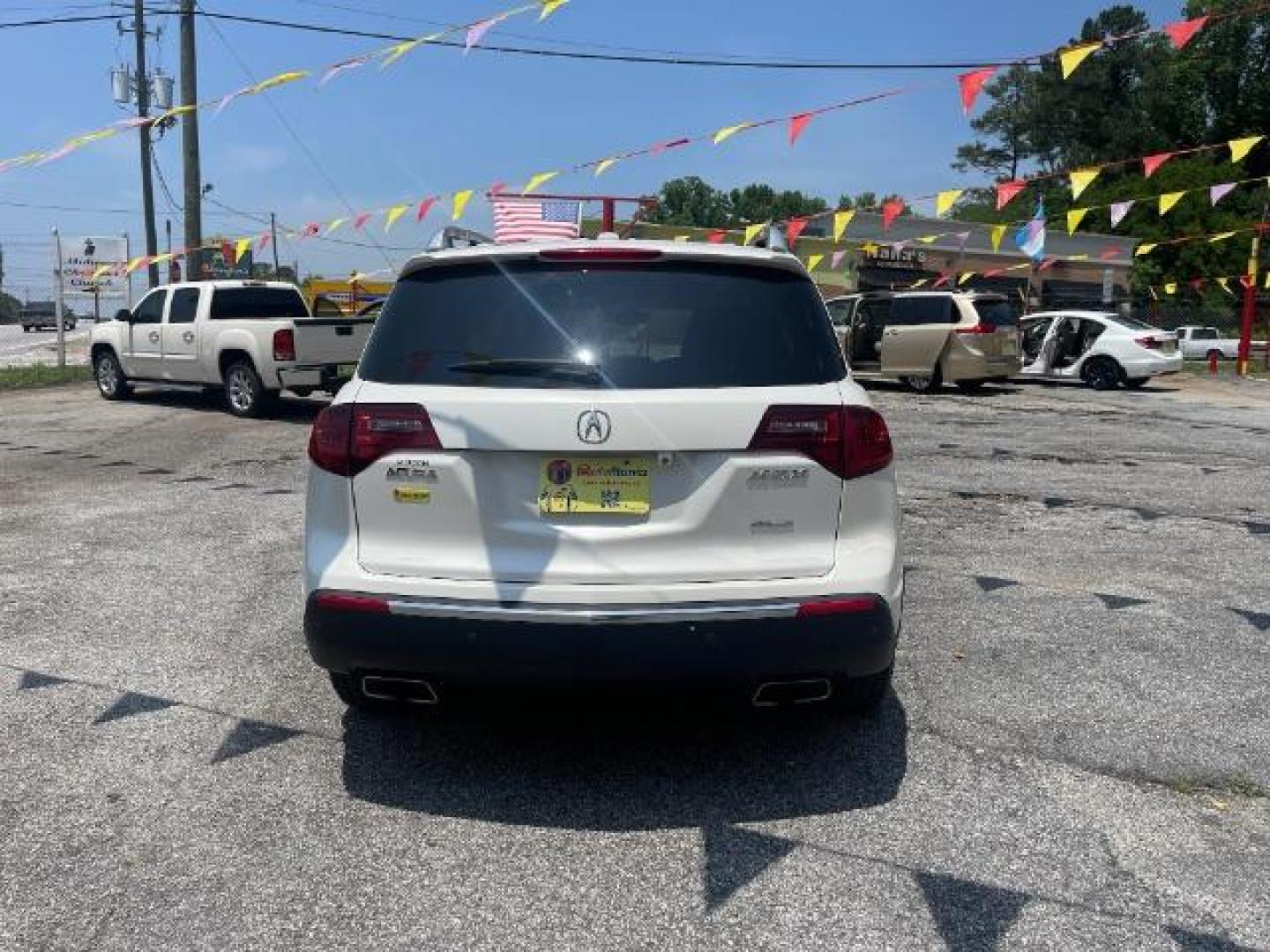 2011 White Acura MDX 6-Spd AT w/Tech Pack (2HNYD2H69BH) with an 3.7L V6 SOHC 24V engine, 6-Speed Automatic transmission, located at 1806 Veterans Memorial Hwy SW, Austell, GA, 30168, (770) 944-9558, 33.817959, -84.606987 - Photo#4