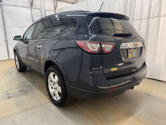 2015 Blue Chevrolet Traverse LS FWD w/PDC (1GNKRFEDXFJ) with an 3.6L V6 DOHC 24V engine, 6-Speed Automatic transmission, located at 1806 Veterans Memorial Hwy SW, Austell, GA, 30168, (770) 944-9558, 33.817959, -84.606987 - Photo#3