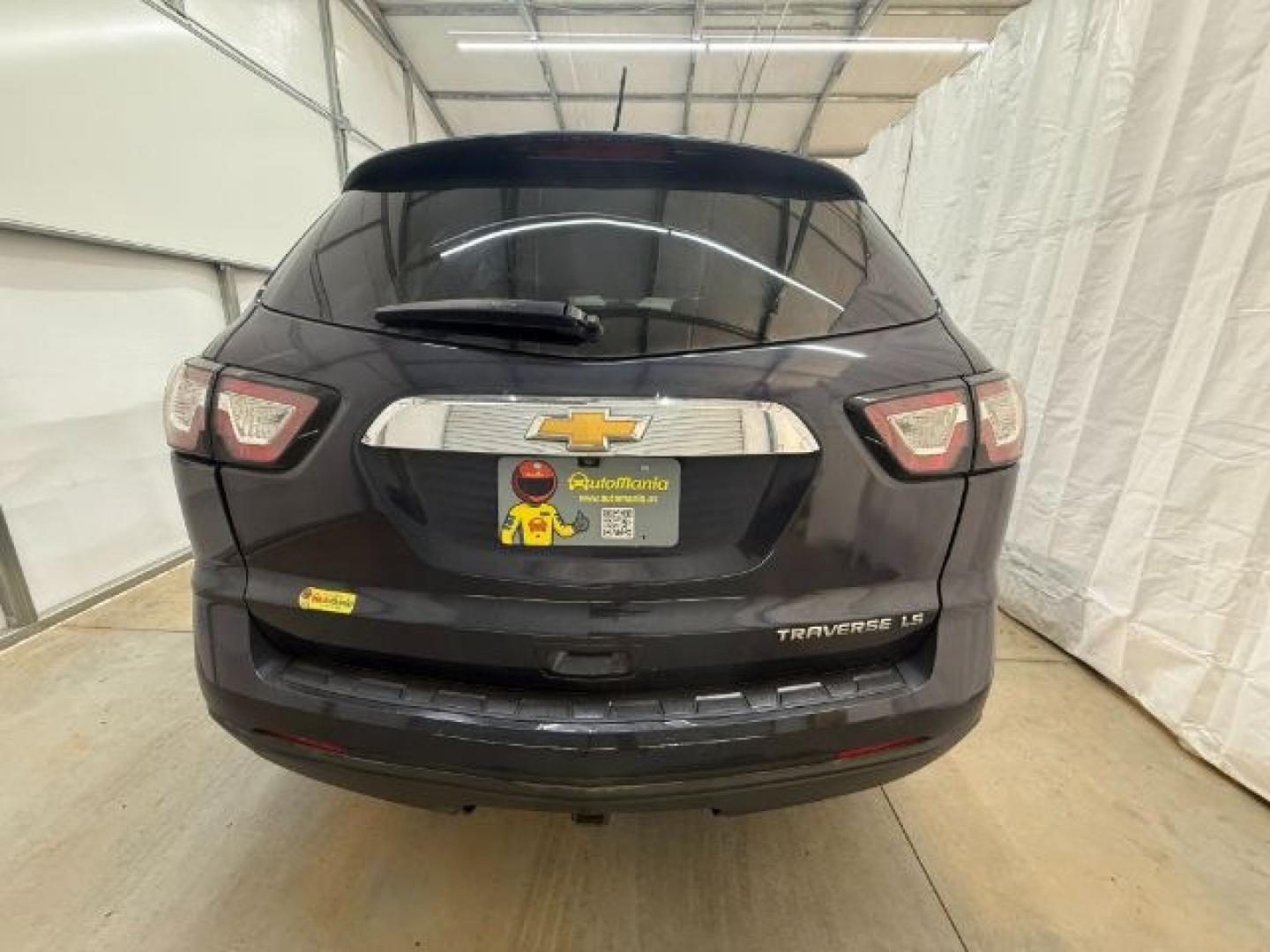 2015 Blue Chevrolet Traverse LS FWD w/PDC (1GNKRFEDXFJ) with an 3.6L V6 DOHC 24V engine, 6-Speed Automatic transmission, located at 1806 Veterans Memorial Hwy SW, Austell, GA, 30168, (770) 944-9558, 33.817959, -84.606987 - Photo#4