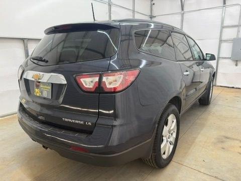 2015 Blue Chevrolet Traverse LS FWD w/PDC (1GNKRFEDXFJ) with an 3.6L V6 DOHC 24V engine, 6-Speed Automatic transmission, located at 1806 Veterans Memorial Hwy SW, Austell, GA, 30168, (770) 944-9558, 33.817959, -84.606987 - Photo#5