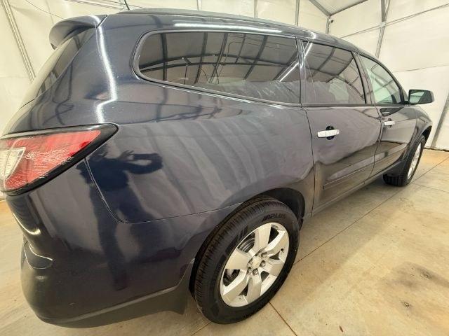 2015 Blue Chevrolet Traverse LS FWD w/PDC (1GNKRFEDXFJ) with an 3.6L V6 DOHC 24V engine, 6-Speed Automatic transmission, located at 1806 Veterans Memorial Hwy SW, Austell, GA, 30168, (770) 944-9558, 33.817959, -84.606987 - Photo#6