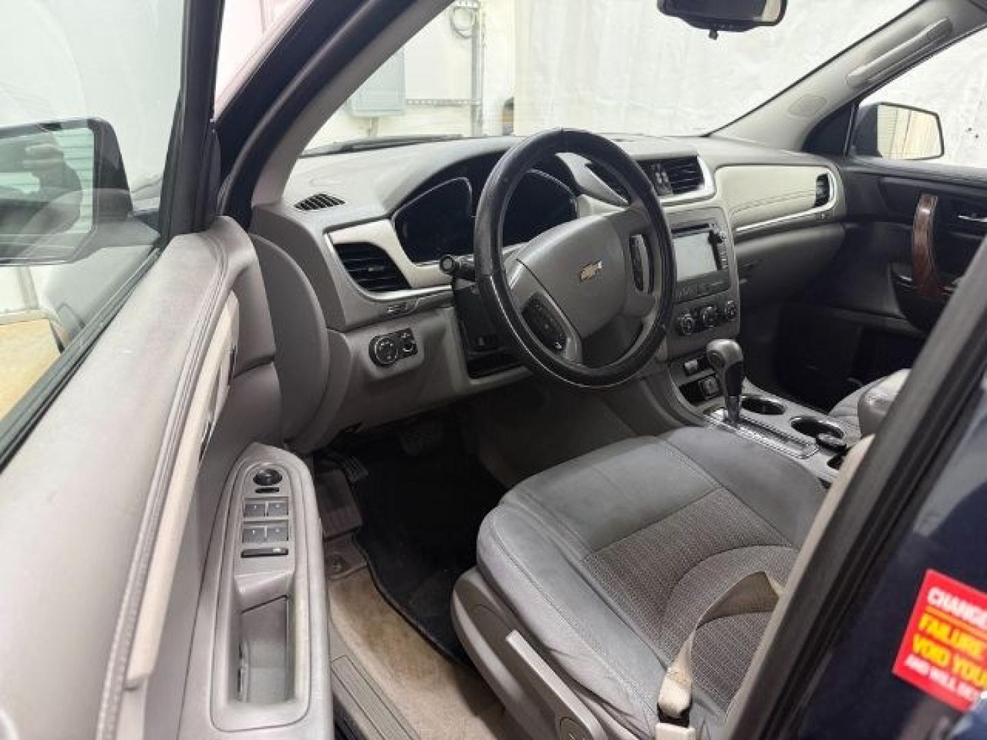 2015 Blue Chevrolet Traverse LS FWD w/PDC (1GNKRFEDXFJ) with an 3.6L V6 DOHC 24V engine, 6-Speed Automatic transmission, located at 1806 Veterans Memorial Hwy SW, Austell, GA, 30168, (770) 944-9558, 33.817959, -84.606987 - Photo#8