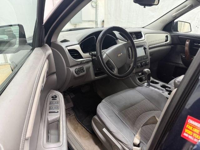 2015 Blue Chevrolet Traverse LS FWD w/PDC (1GNKRFEDXFJ) with an 3.6L V6 DOHC 24V engine, 6-Speed Automatic transmission, located at 1806 Veterans Memorial Hwy SW, Austell, GA, 30168, (770) 944-9558, 33.817959, -84.606987 - Photo#8