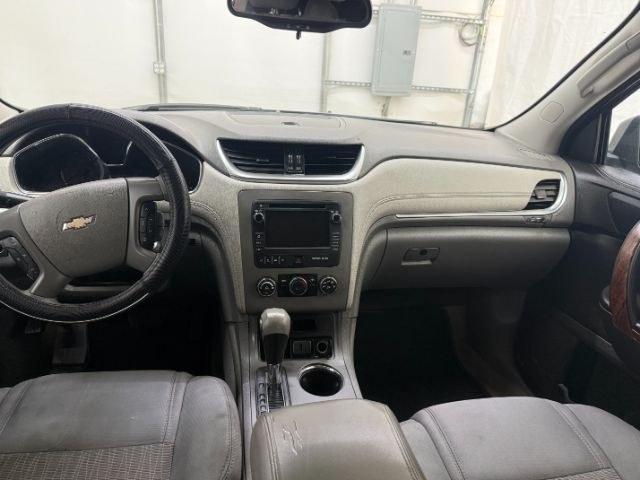 2015 Blue Chevrolet Traverse LS FWD w/PDC (1GNKRFEDXFJ) with an 3.6L V6 DOHC 24V engine, 6-Speed Automatic transmission, located at 1806 Veterans Memorial Hwy SW, Austell, GA, 30168, (770) 944-9558, 33.817959, -84.606987 - Photo#9
