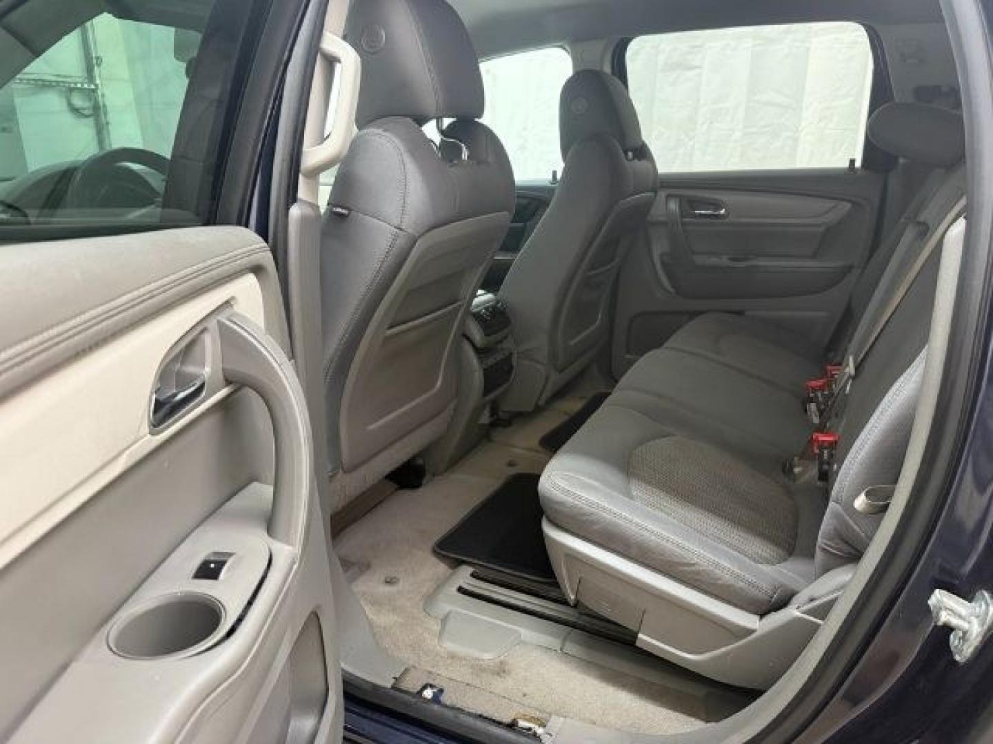 2015 Blue Chevrolet Traverse LS FWD w/PDC (1GNKRFEDXFJ) with an 3.6L V6 DOHC 24V engine, 6-Speed Automatic transmission, located at 1806 Veterans Memorial Hwy SW, Austell, GA, 30168, (770) 944-9558, 33.817959, -84.606987 - Photo#10